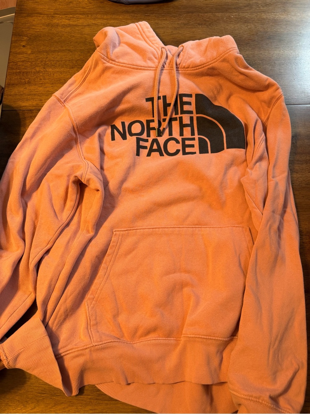 The North Face Men’s Peach Pullover Hoodie with Black Logo